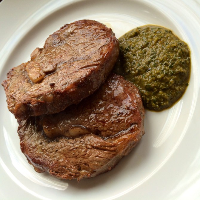 Grass-fed beef ribeyes with chimichurri