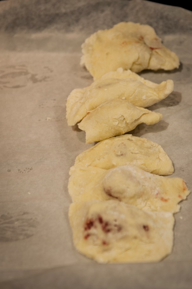 Not perfect, but not bad for a first attempt. I made sure the exposed meat was covered by dough before placing in the freezer. otherwise, they would open up in the boiling water and make a mess.