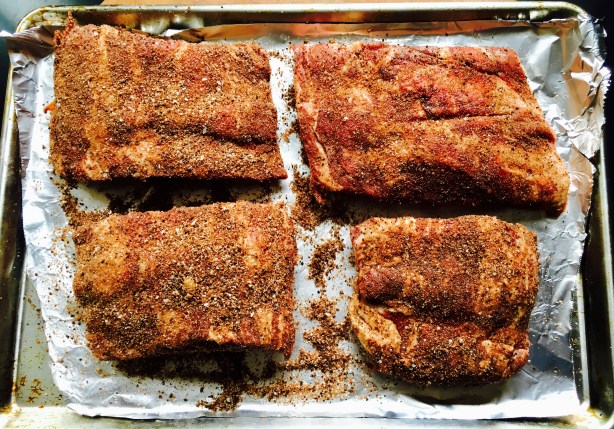 Let the rubbed ribs sit for 30 minutes.